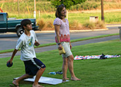 Playing Cornhole at Friday on the Green