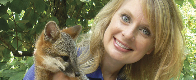 Naturalist Marianne Hudson with baby fox
